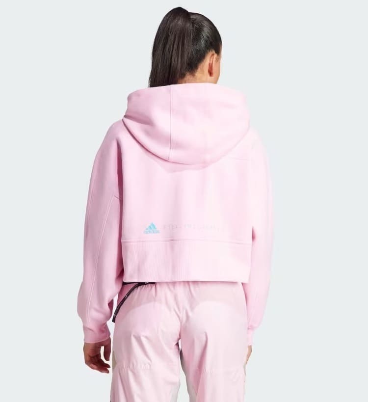 La chaqueta con capucha de color rosa Adidas by Stella McCartney cropped