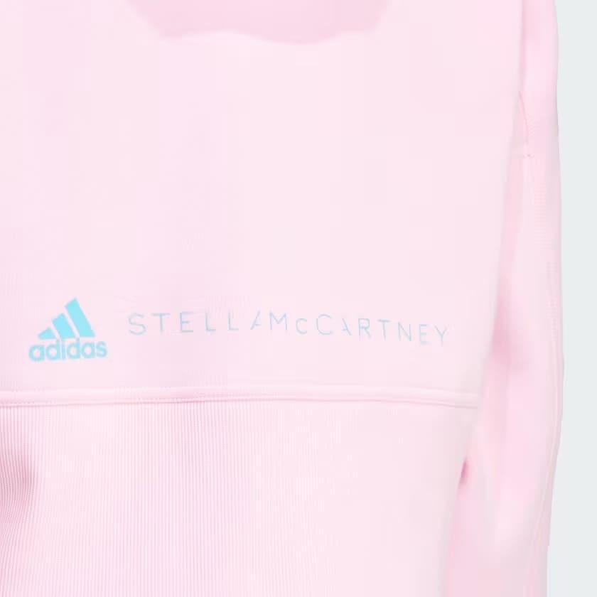 La chaqueta con capucha de color rosa Adidas by Stella McCartney cropped