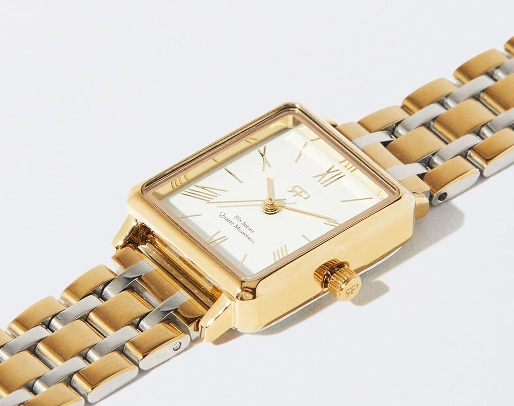 Reloj de acero dorado con caja cuadrada de Parfois