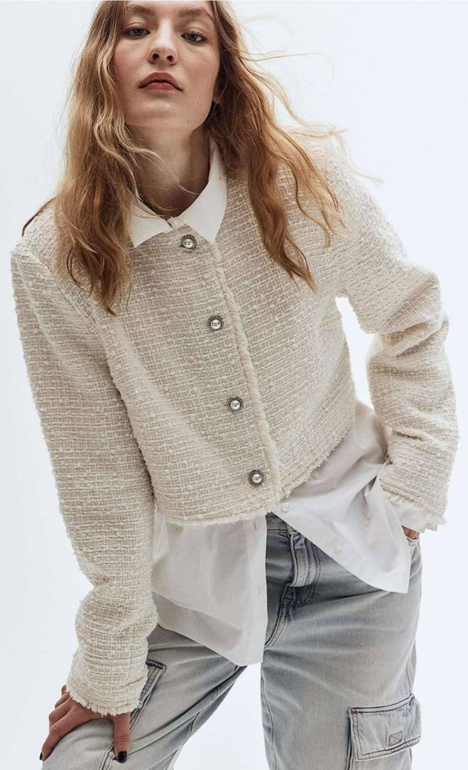 Chaqueta cropped en tejido bouclé de H&M