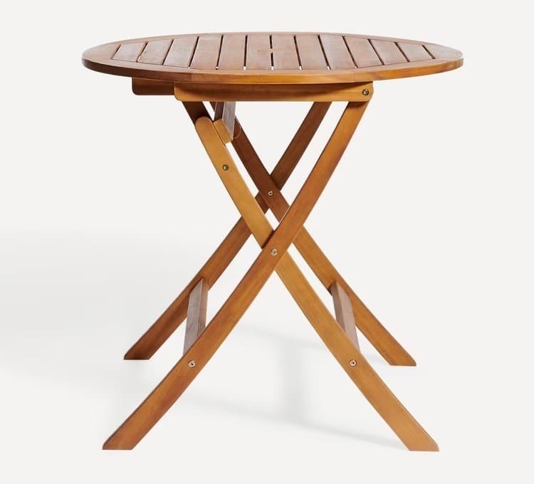 La mesa de comedor redonda plegable de madera de acacia Baiona de El Corte Inglés