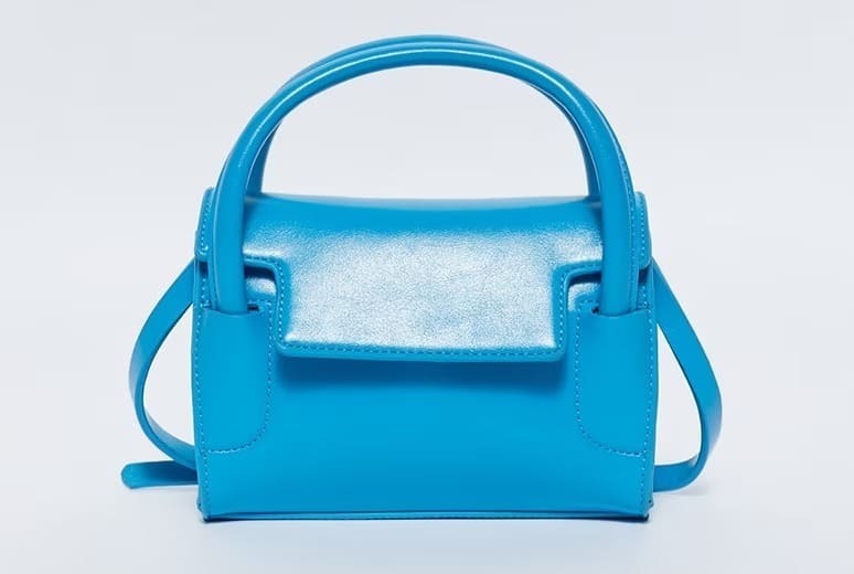 El minibolso con detalle en asas de Sfera en El Corte Inglés