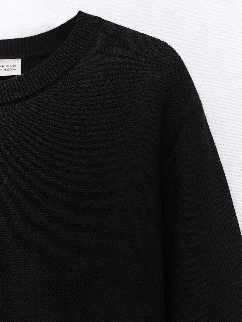 El vestido corto de punto negro de Zara