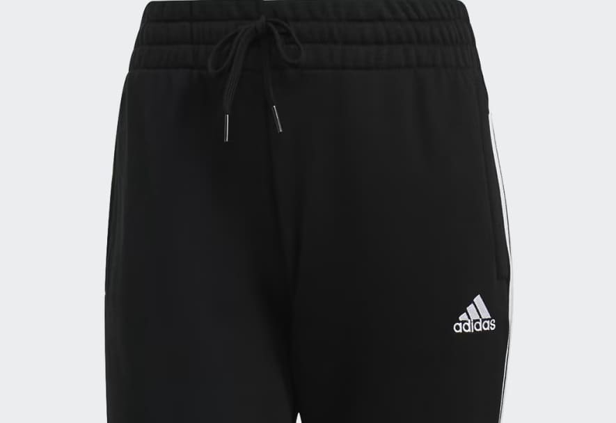 El pantalón Essentials French Terry 3 bandas de Adidas