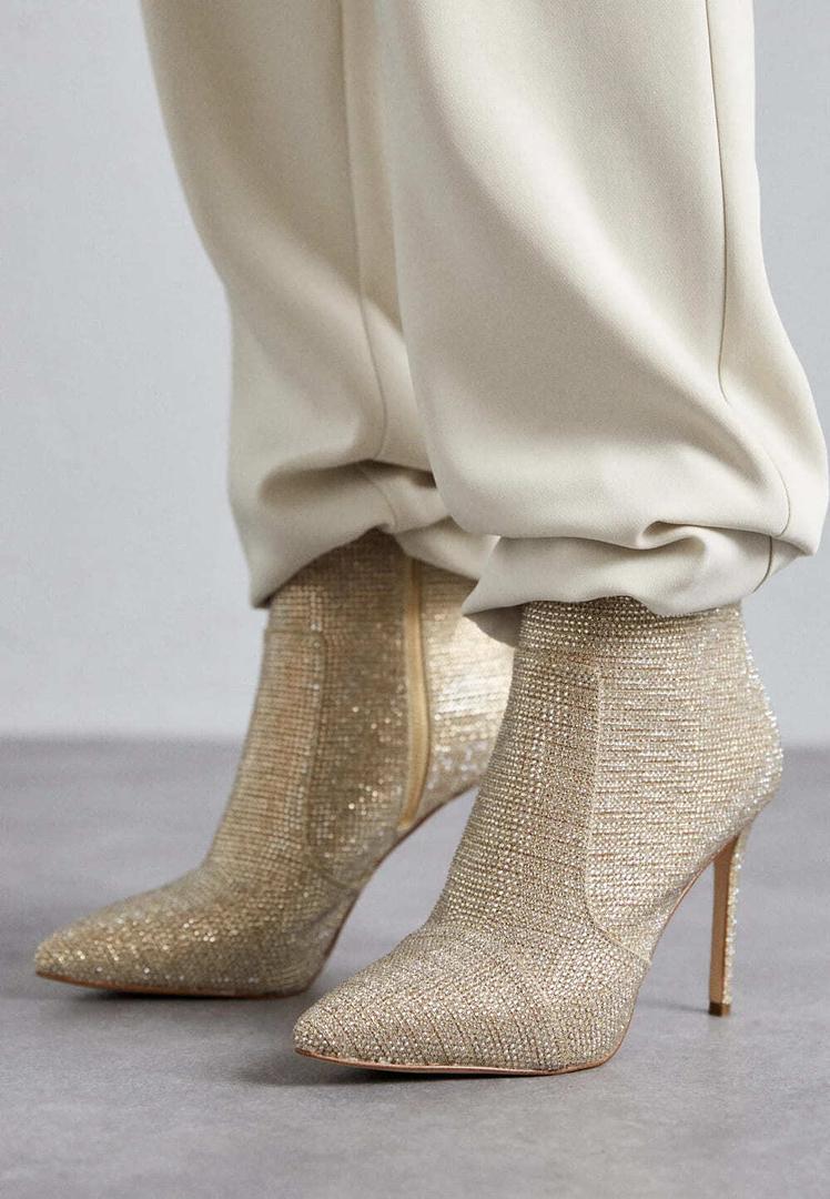 Los botines Rue de malla de cadena brillante con adornos de Michael Kors