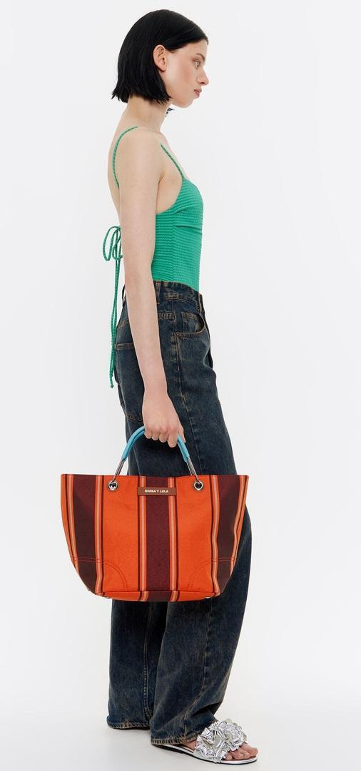 El nuevo bolso de mano Canopy mediano de color naranja de Bimba y Lola