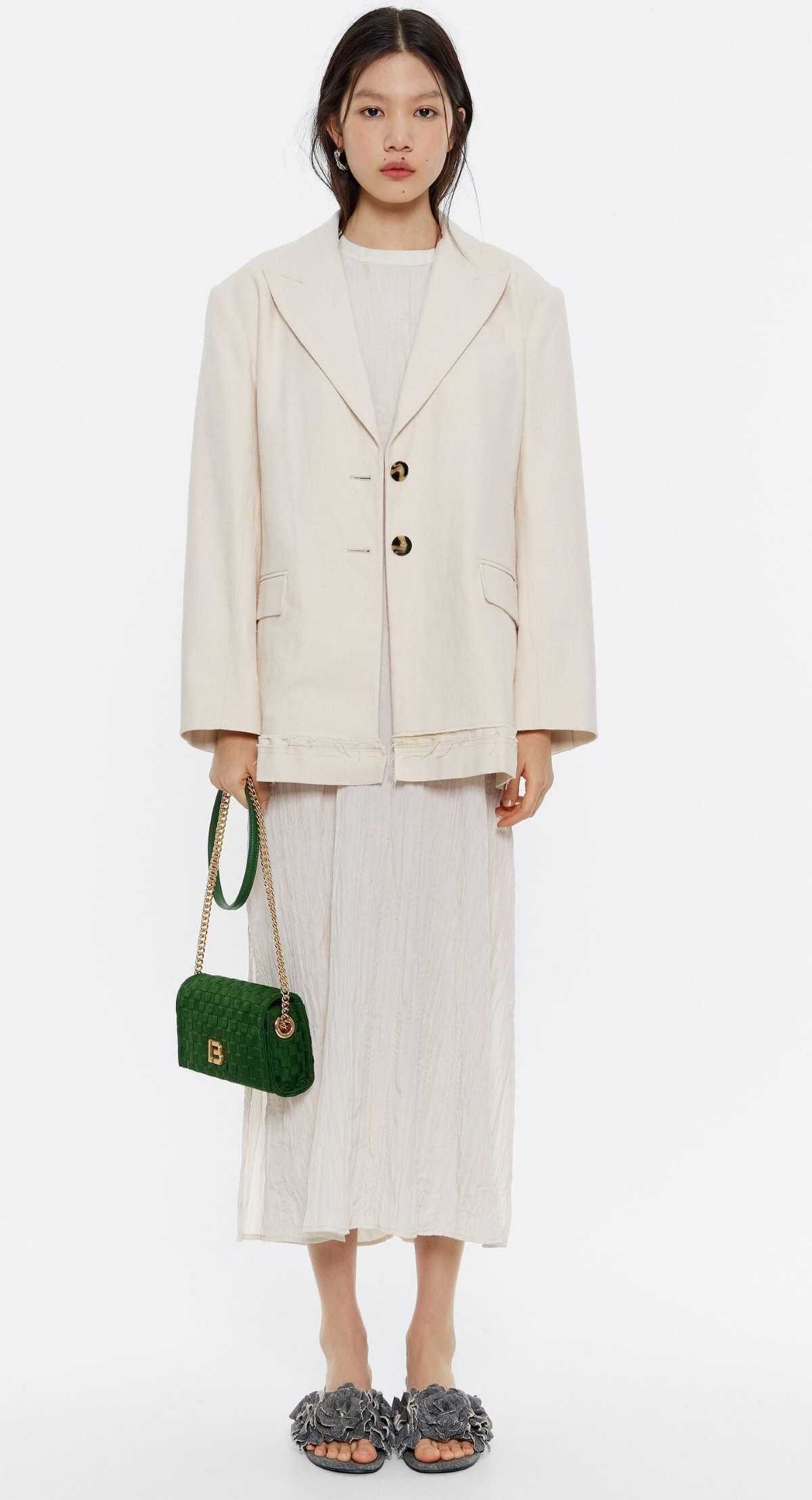 Bolso solapa mini nylon trenzado verde de Bimba y Lola