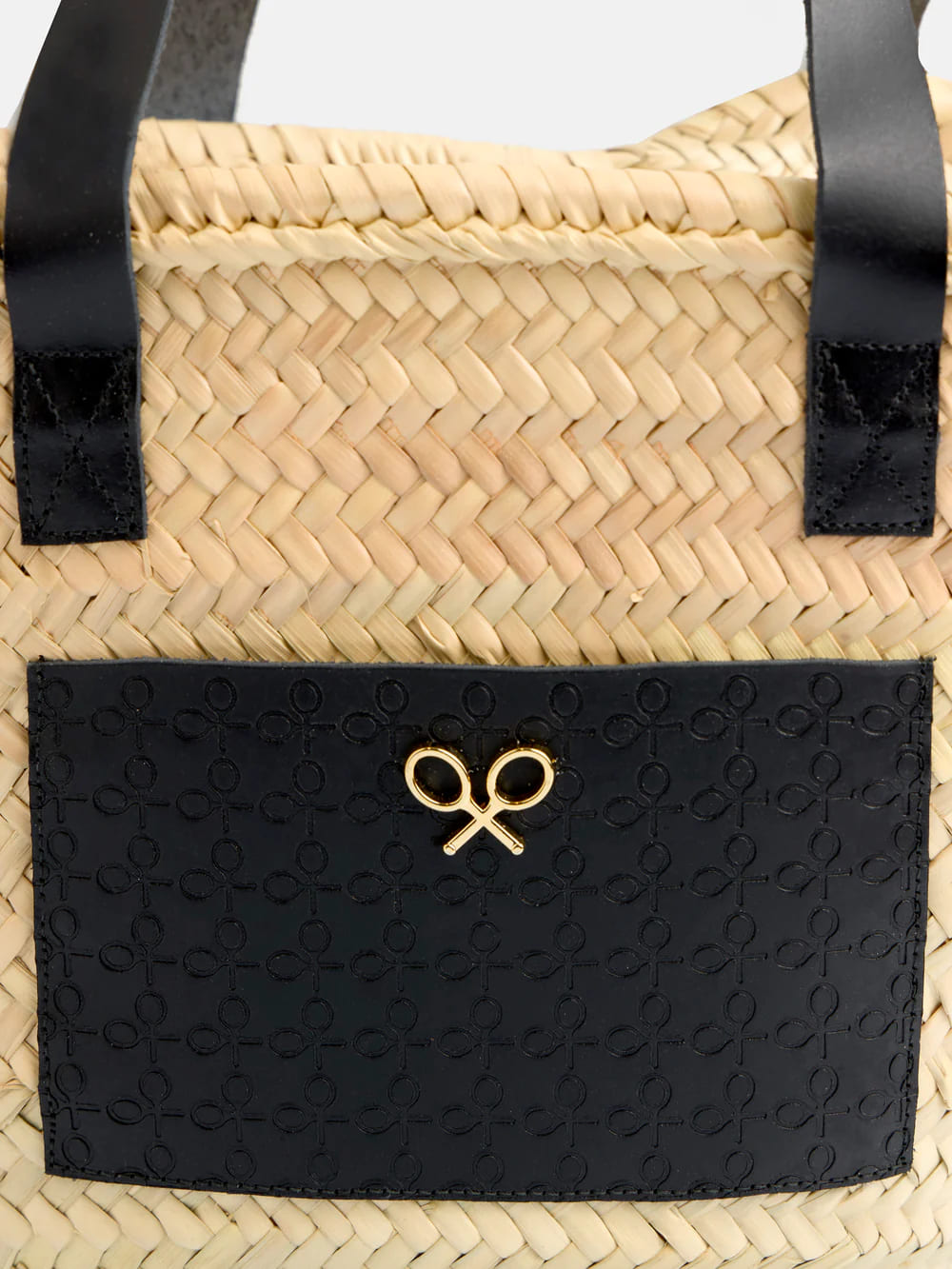 El bolso capazo de rafia con bolsillo de piel negro de Silbon