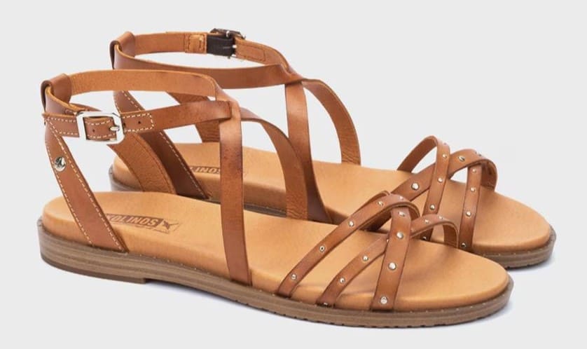 Sandalias planas de piel con hebilla y pala cruzada