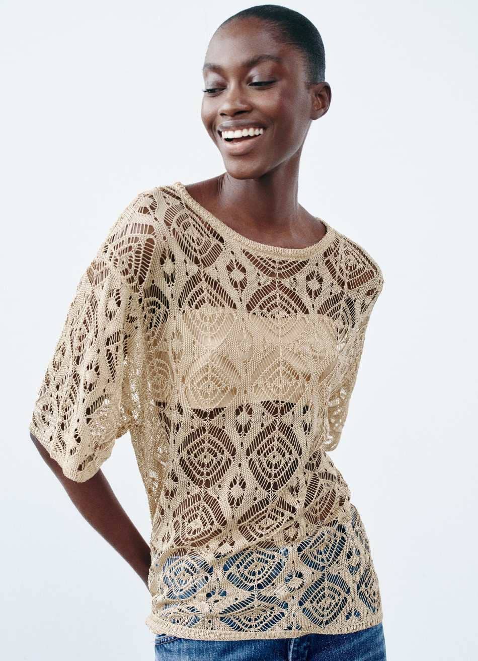 Top punto hilo metalizado de Zara