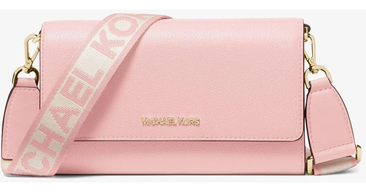 El bolso bandolera Jet Set grande de piel rosa de Michael Kors