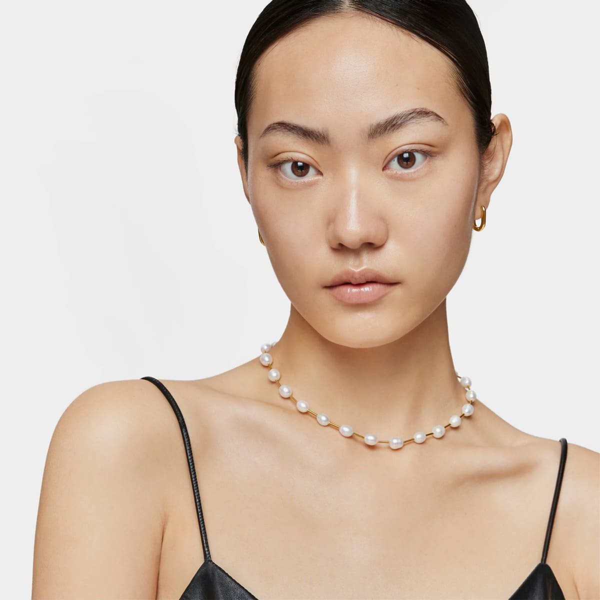 El collar gargantilla de tubo con baño de oro de 18 kt sobre plata y perlas cultivadas Gloss de Tous