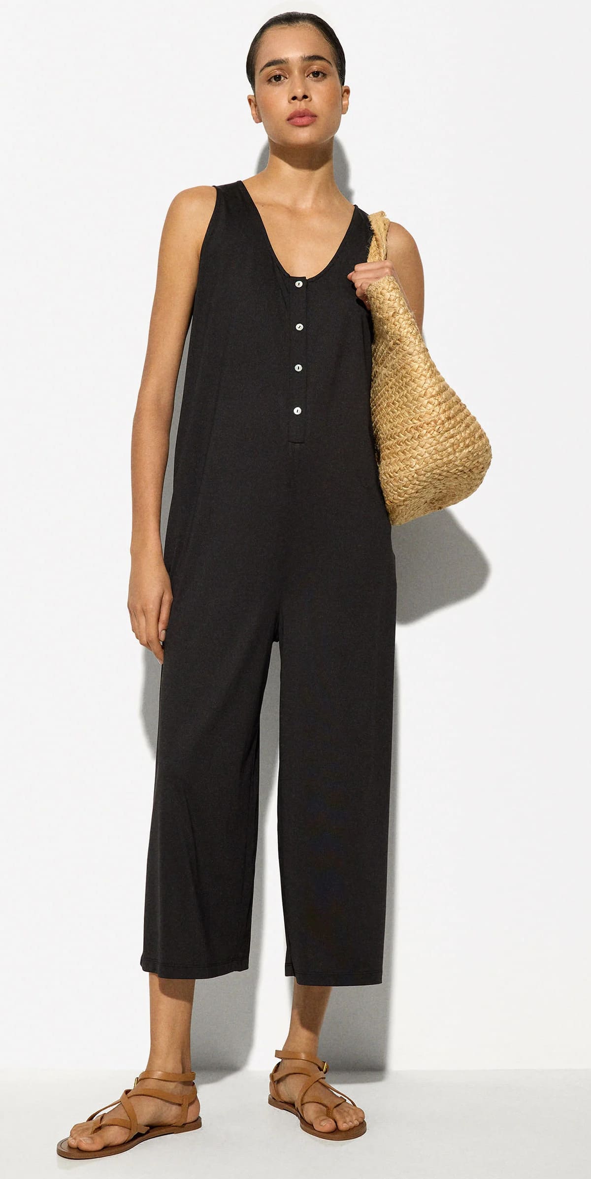 El mono fluido con botones negro de Parfois