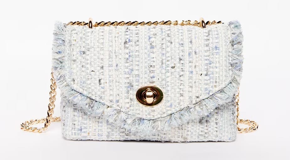 El bolso crossbody mini con flecos de Sfera en El Corte Inglés