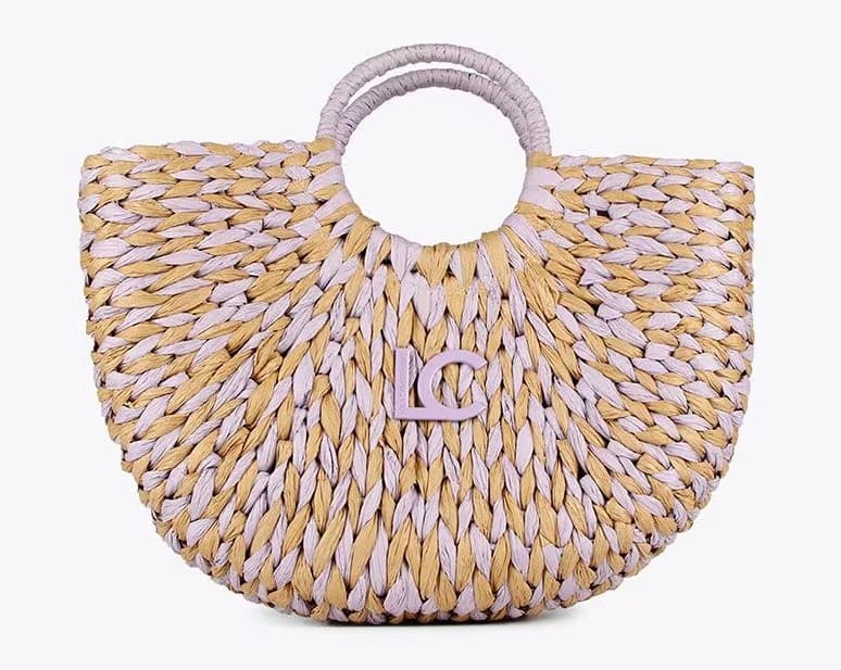 El bolso de mano tipo cesto con cierre de cremallera de Lola Casademunt en El Corte Inglés