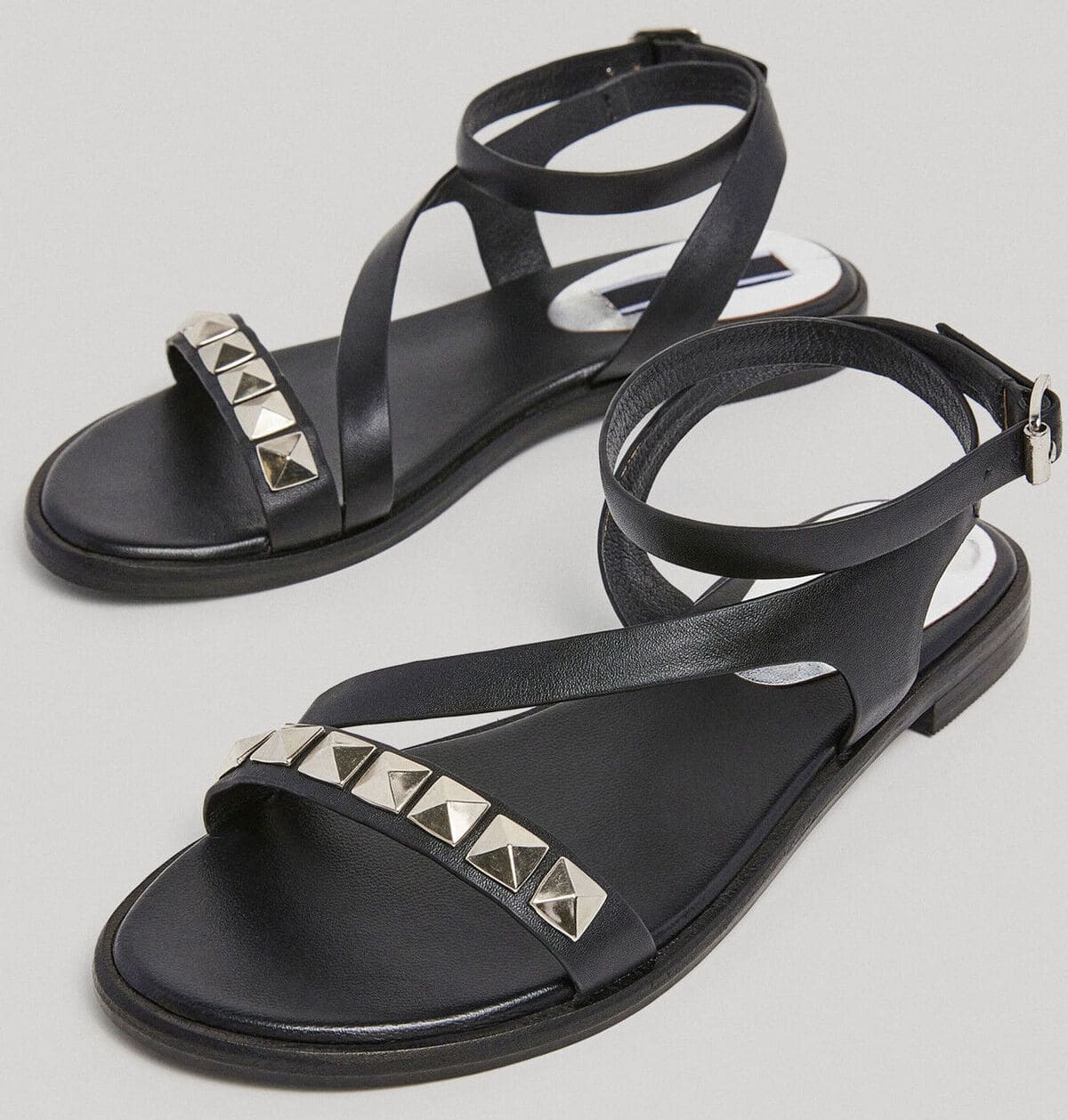 Las sandalias planas de piel negras de Pepe Jeans