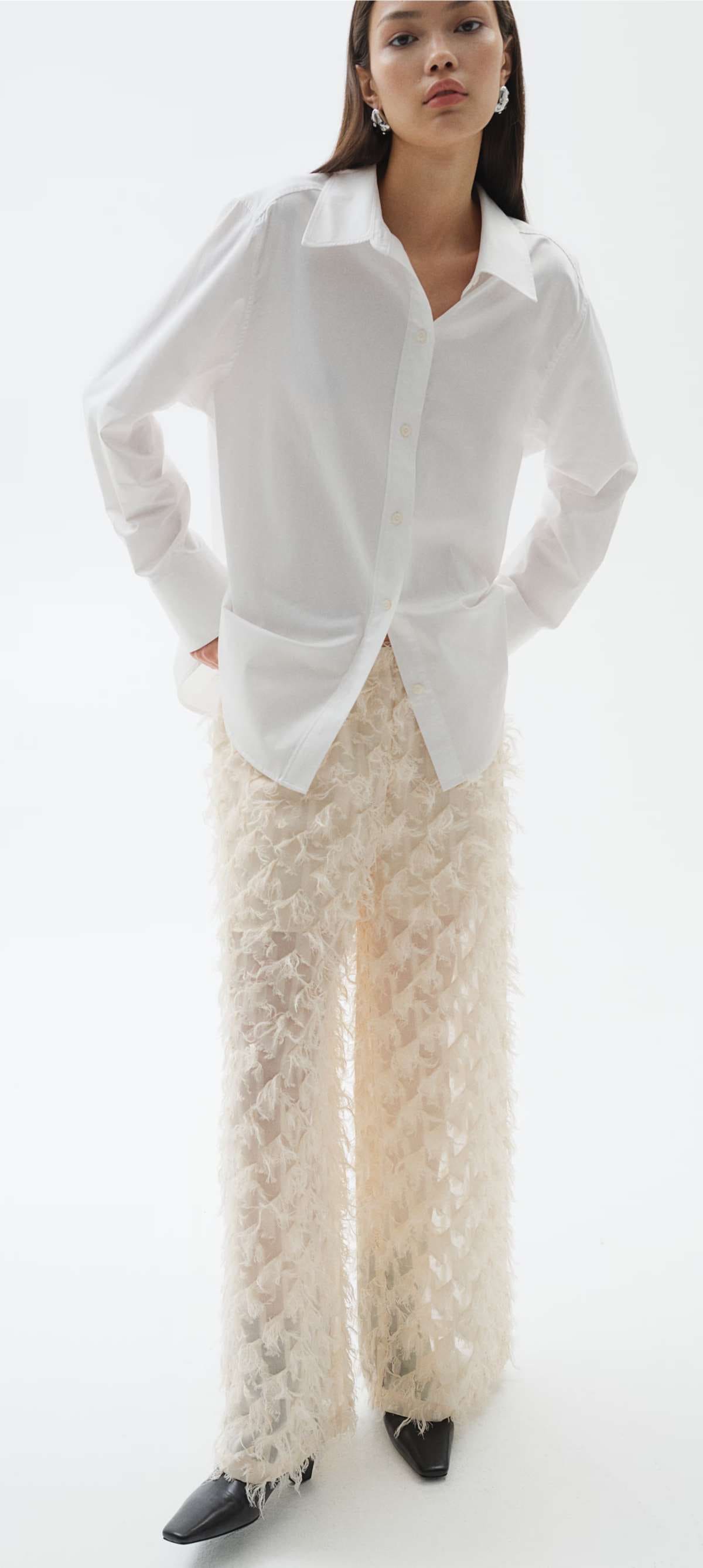 Pantalón con flecos de H&M