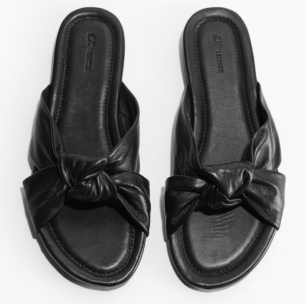 Las sandalias de piel con nudo decorativo negras de H&M