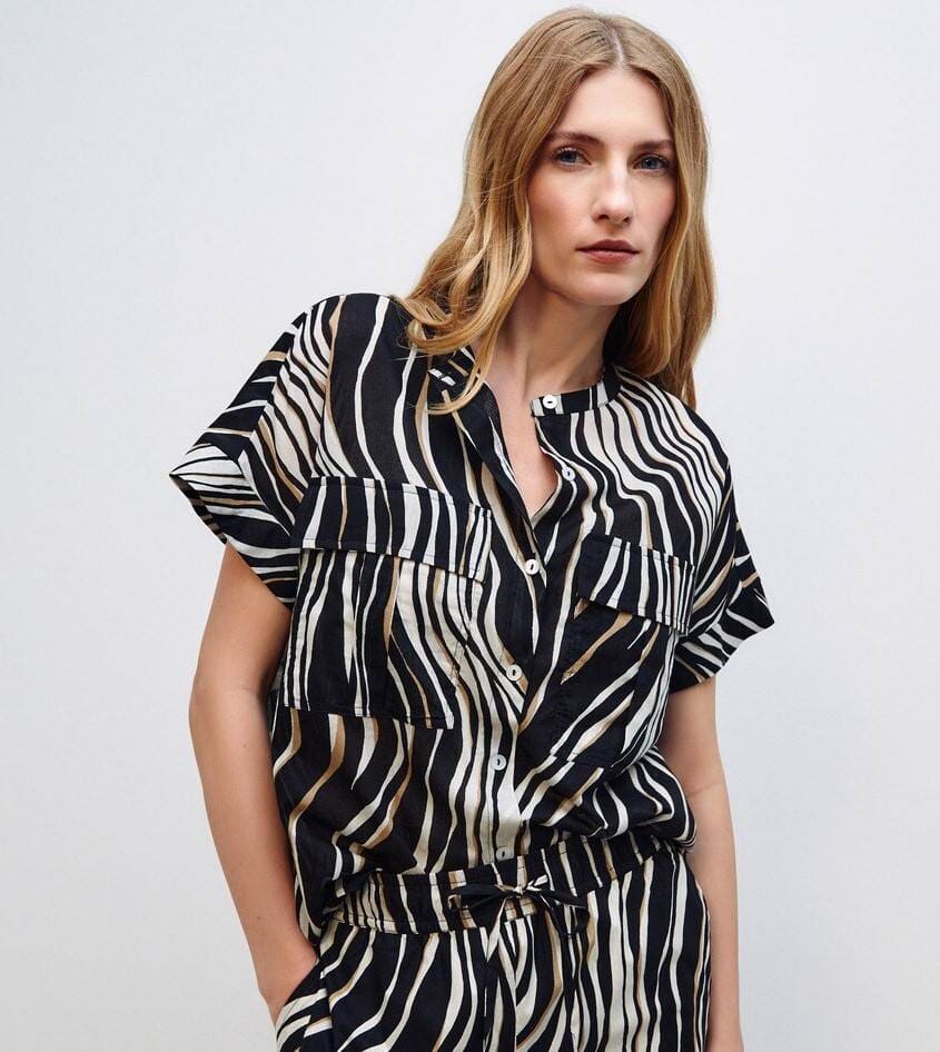 Woman El Corte Inglés Blusa de mujer manga corta lisa