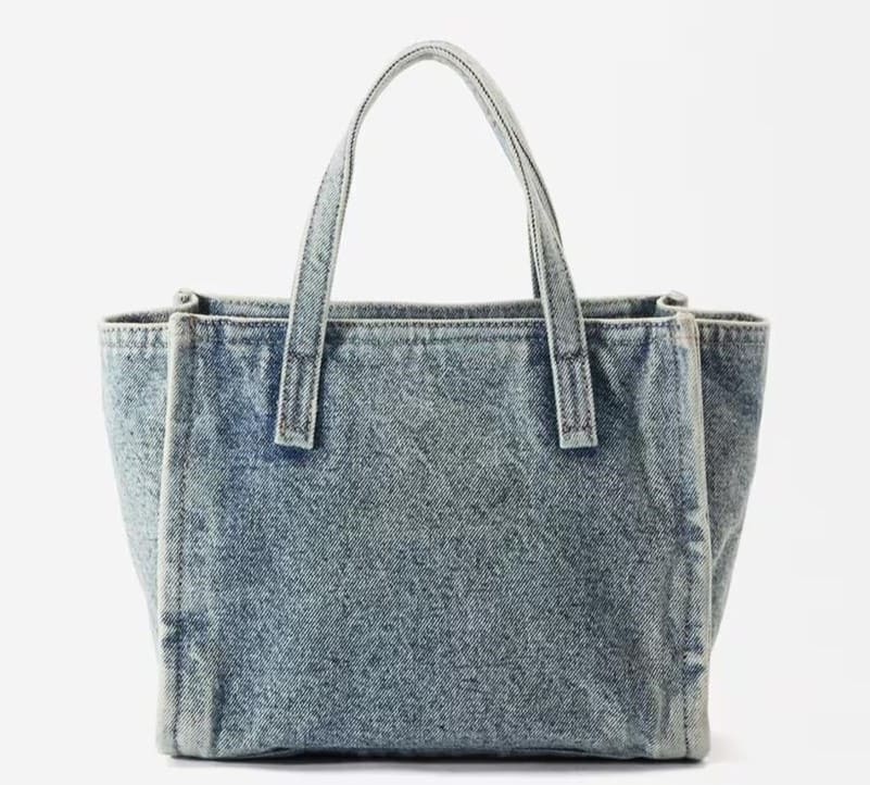 Bolso de mano estilo tote convertible a bandolera vaquero con cierre de cremallera