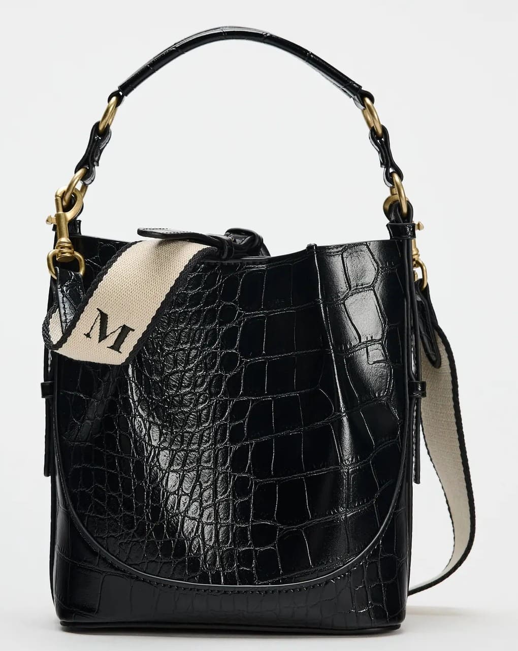 Bolso saca de material sintético