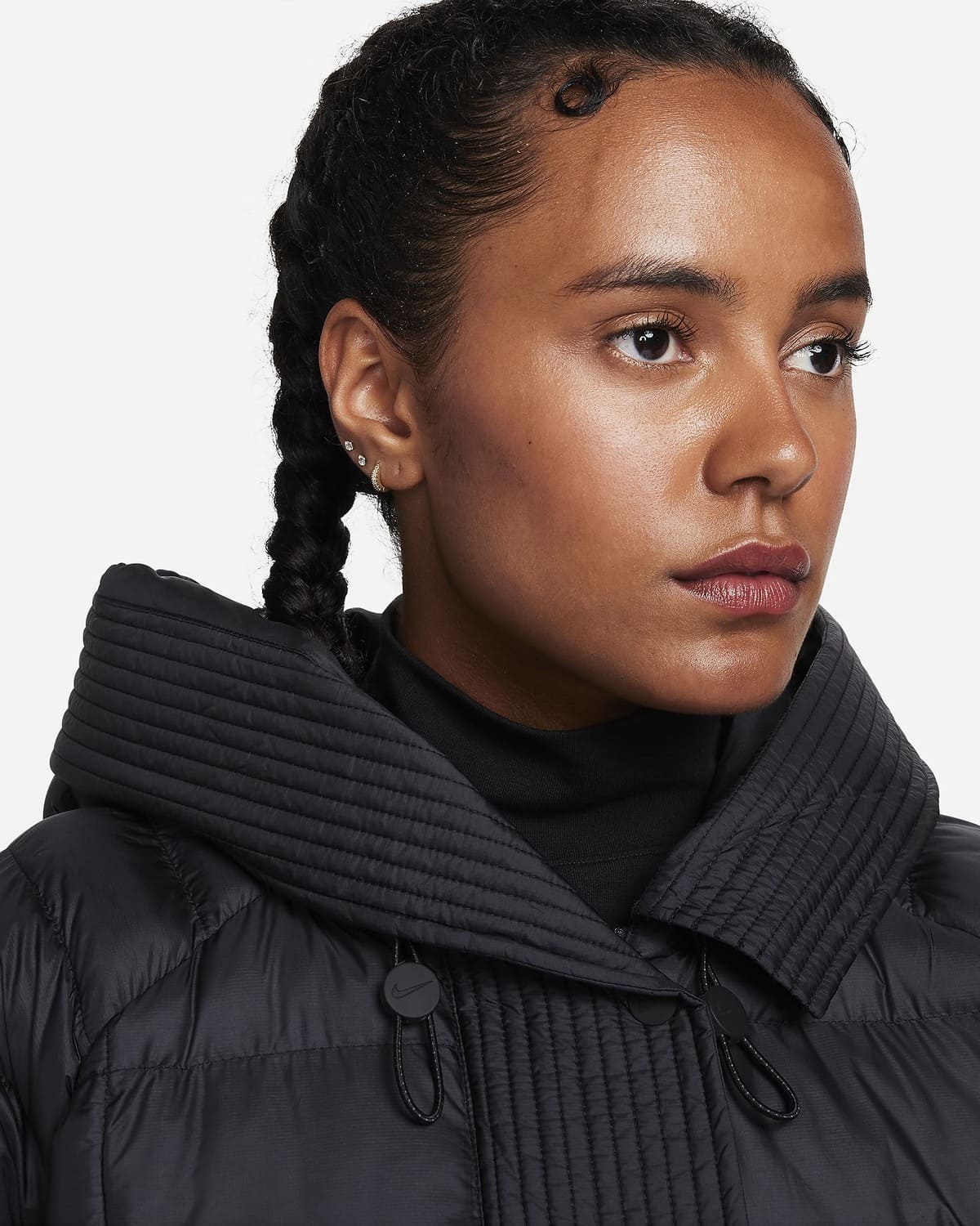 La nueva chaqueta acolchada con capucha de ajuste oversize Therma-FIT de Nike