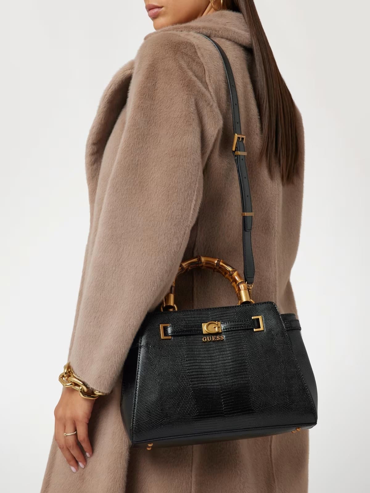 El bolso de mano sibel con estampado pitón de Guess