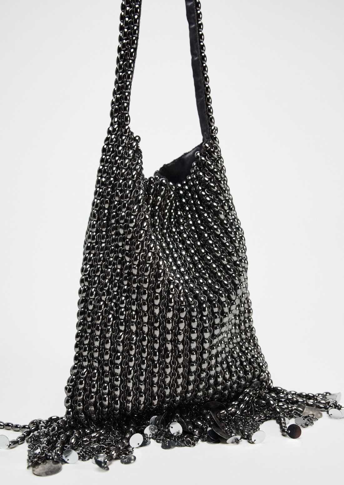 Bolso de hombro apliques metálicos de Zara