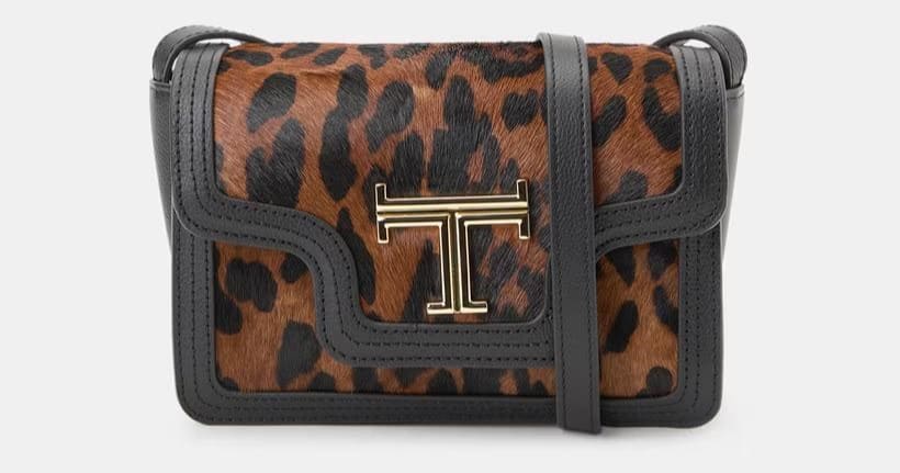 Bandolera con detalles en piel y animal print