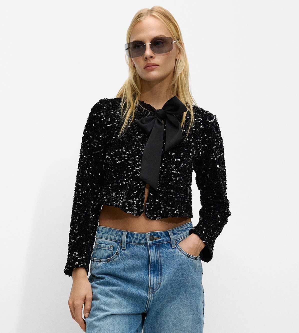 Top con lentejuelas y lazo de Parfois