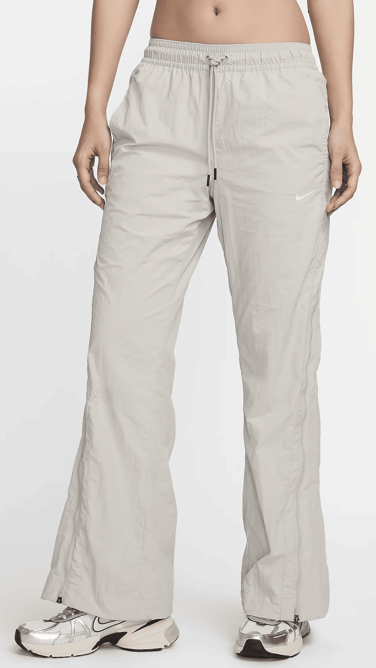 El pantalón Repel de talle medio con cremallera Nike Sportswear Collection