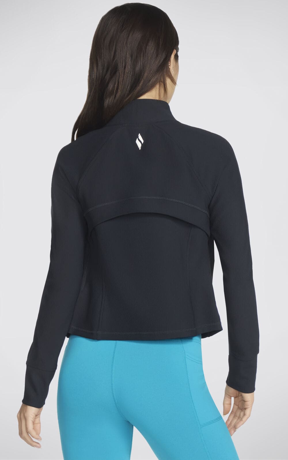 La chaqueta con cremallera GO FLEX Rib Jacket en color negro de Skechers