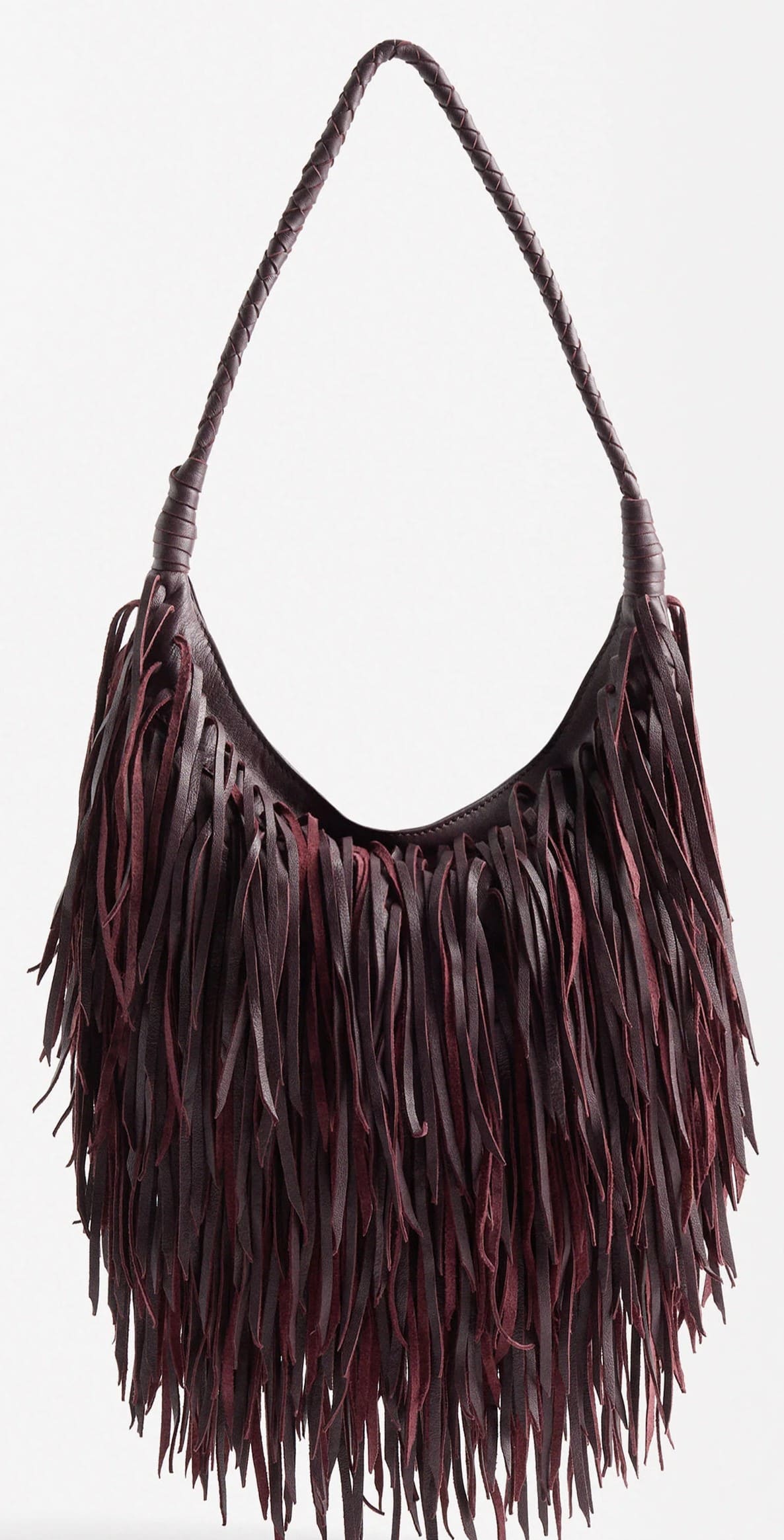 Bolso de hombro elaborado en piel con flecos