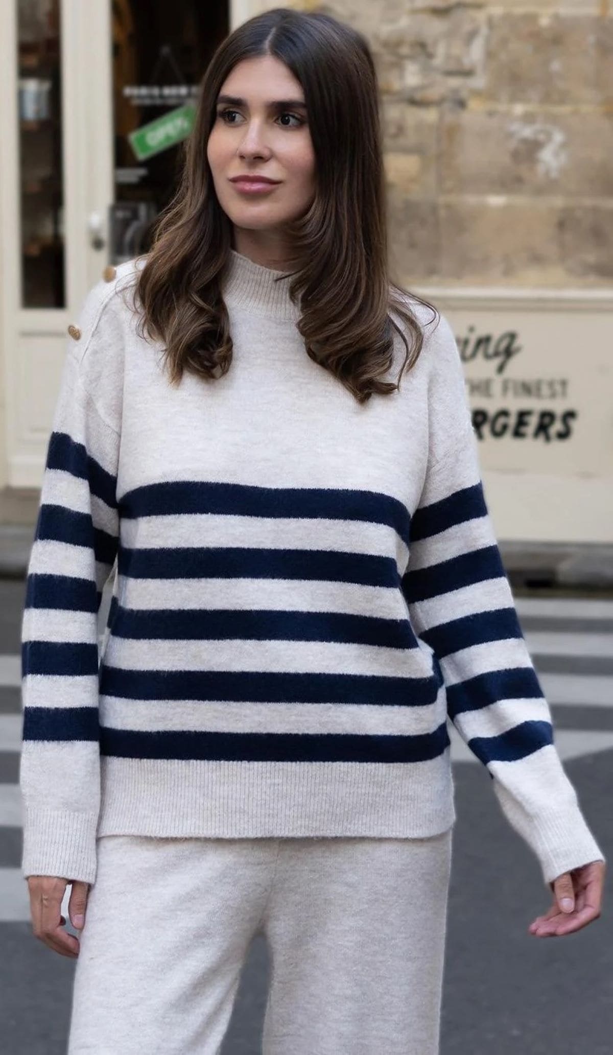 Jersey de manga larga y botones en el hombro colección Mery Turiel TEX de Carrefour