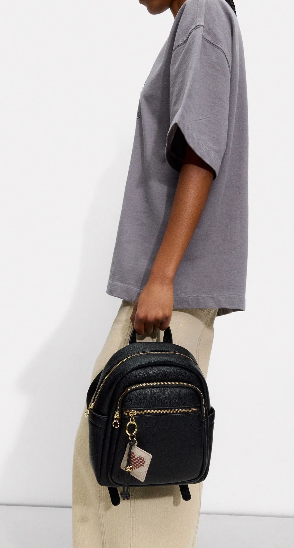 Mochila con colgante corazón