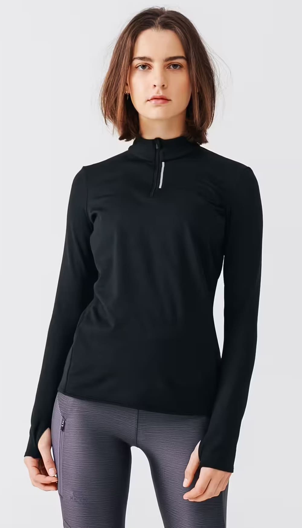 La camiseta térmica de running para mujer en color negro de Kalenji en Decathlon