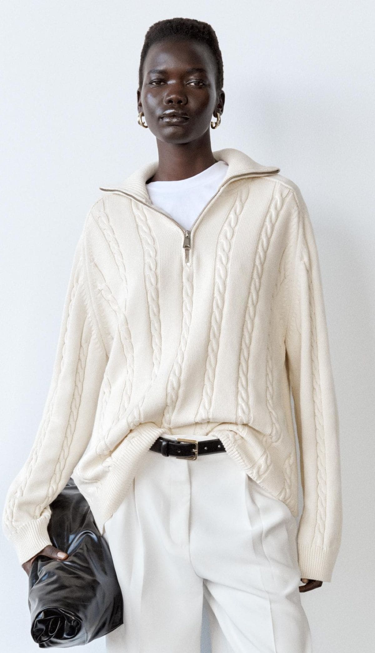 Jersey con cremallera de punto detalle ochos de Zara