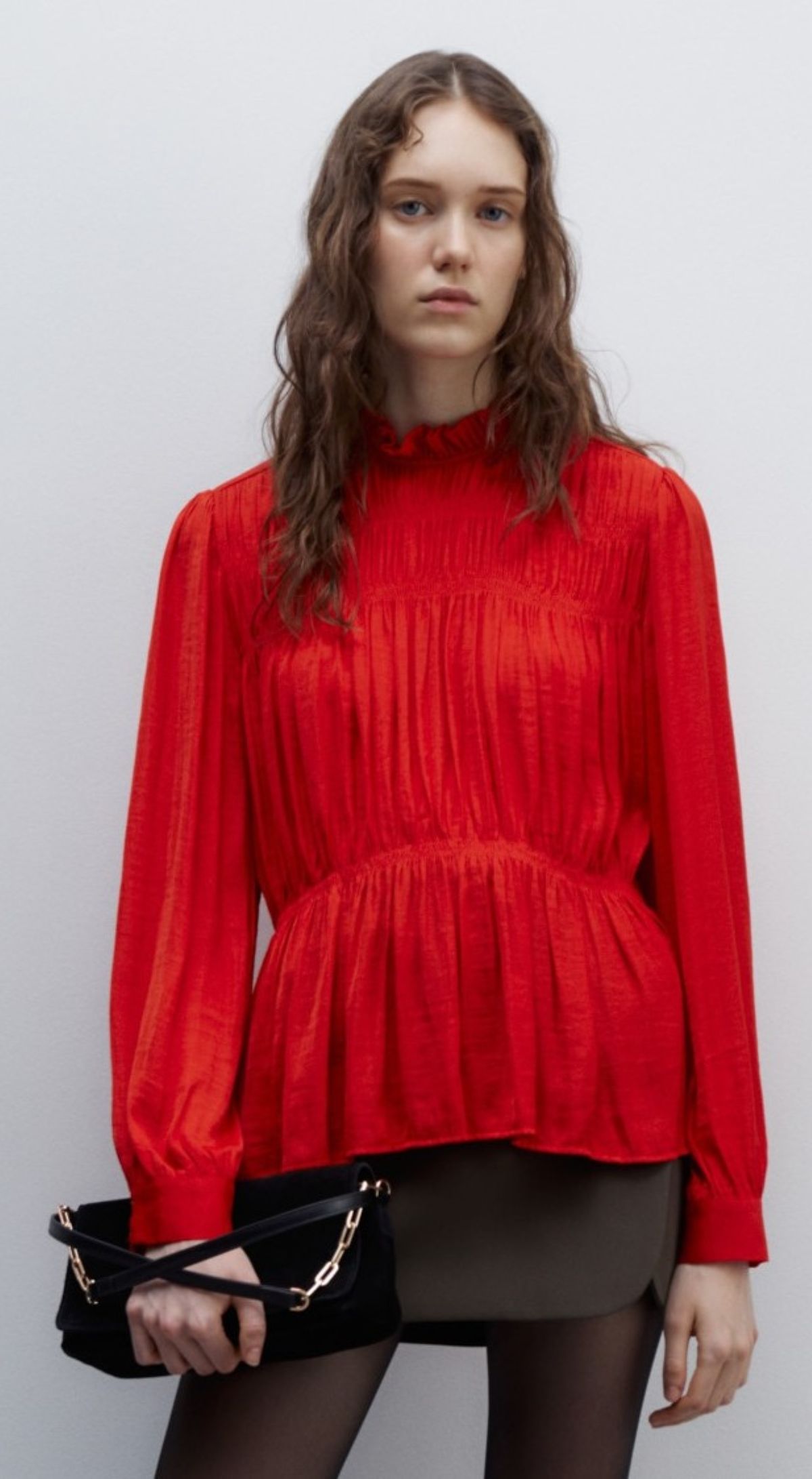 Blusa fluida con frunces de Sfera