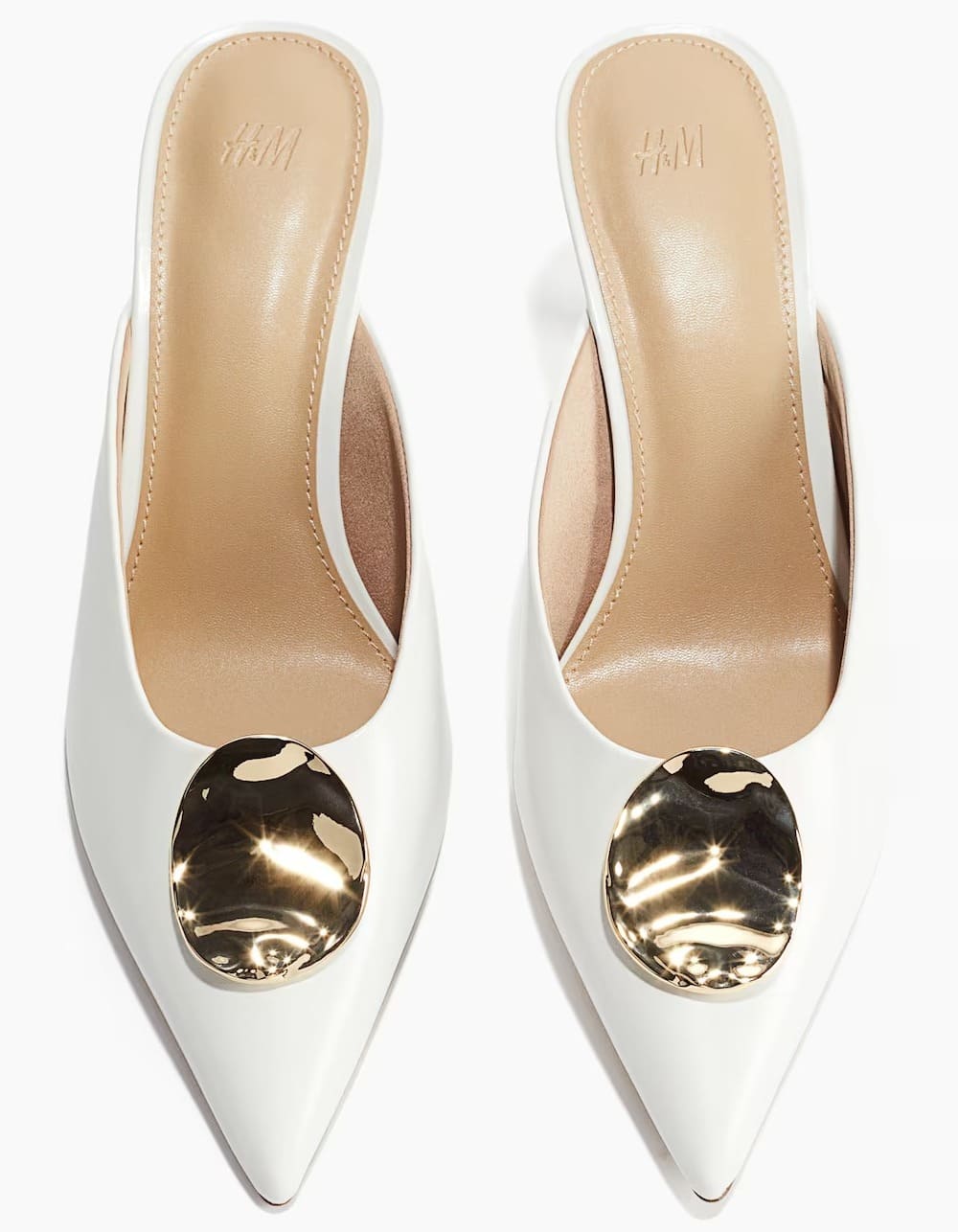 Los nuevos zapatos mueles de tacón con puntera fina en color blanco de H&M