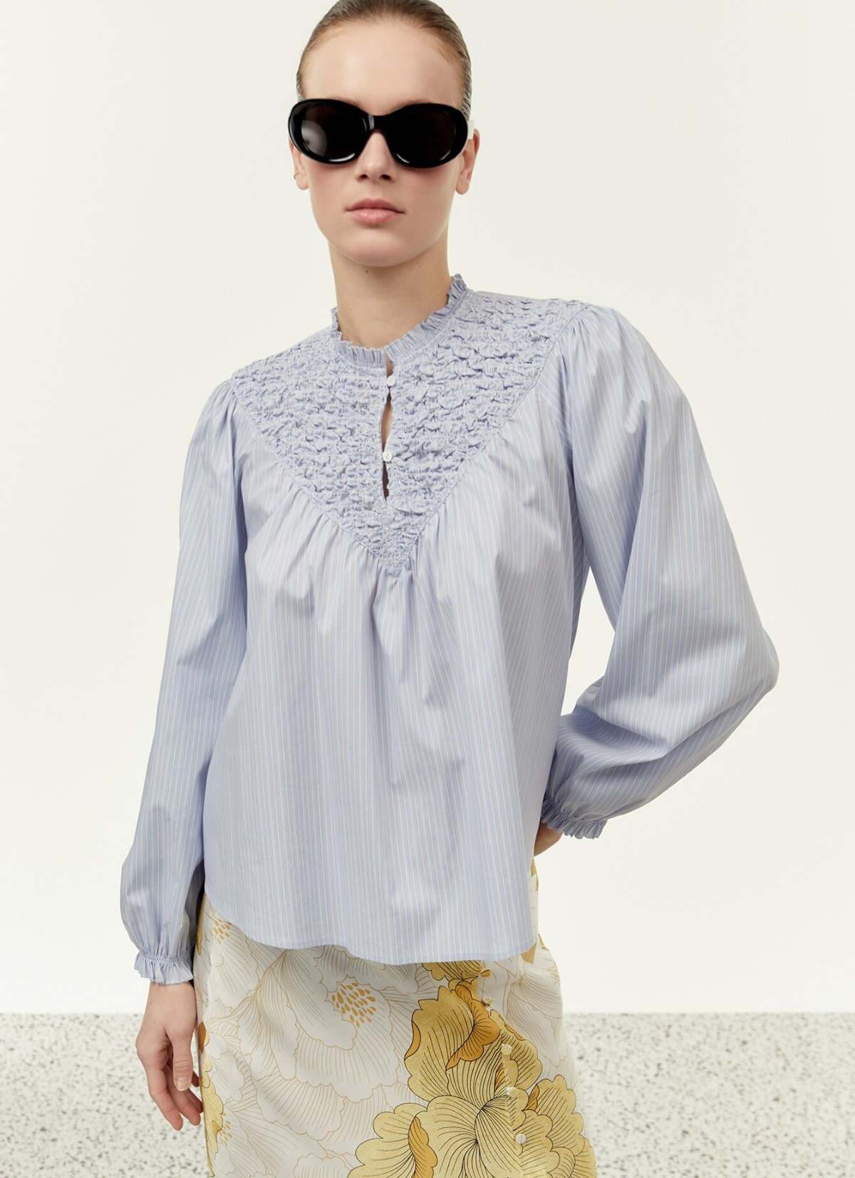 Blusón rayas pechera de Sfera