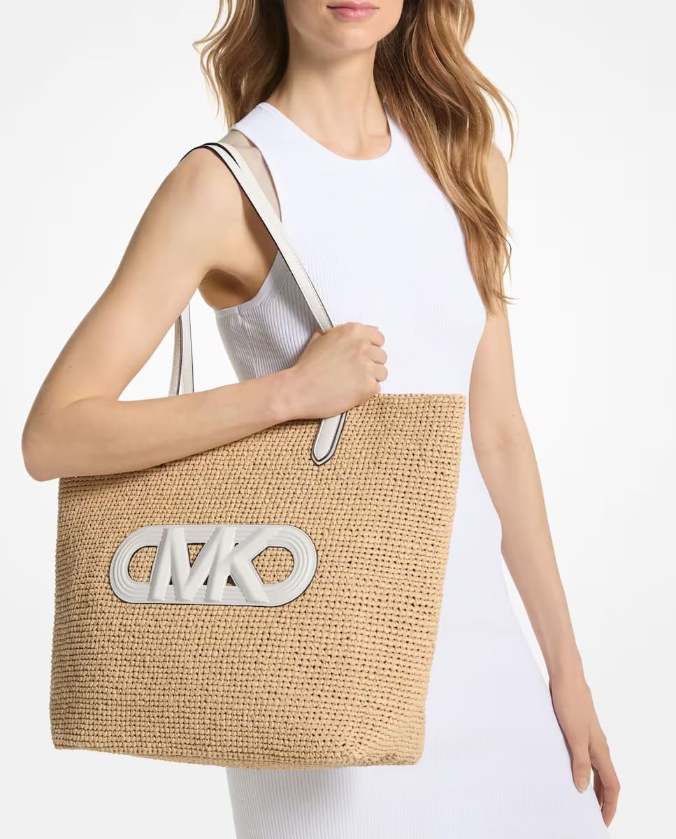 El bolso tote Eliza extragrande de paja con logotipo imperio de Michael Kors
