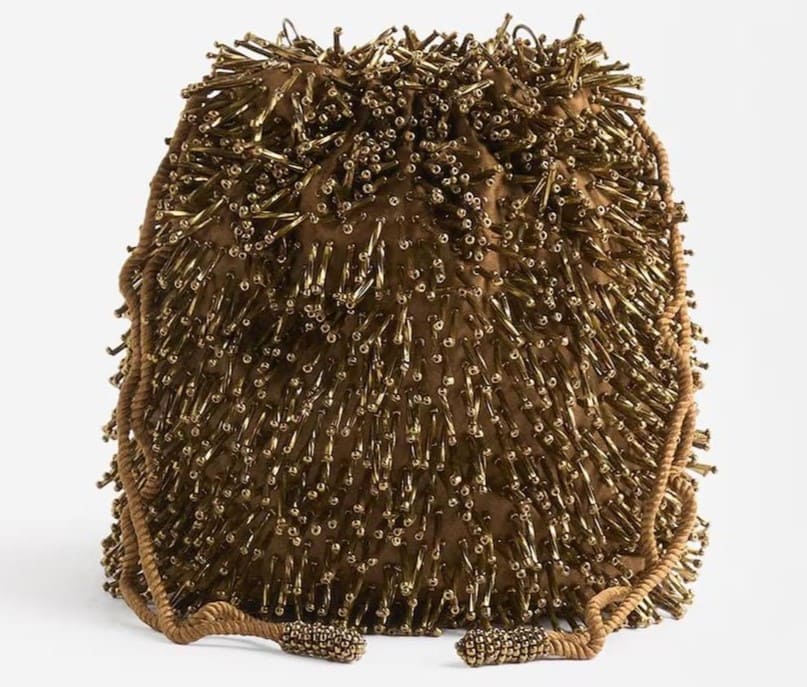 Bolso de fiesta estilo bombonera con abalorios y cierre fruncido