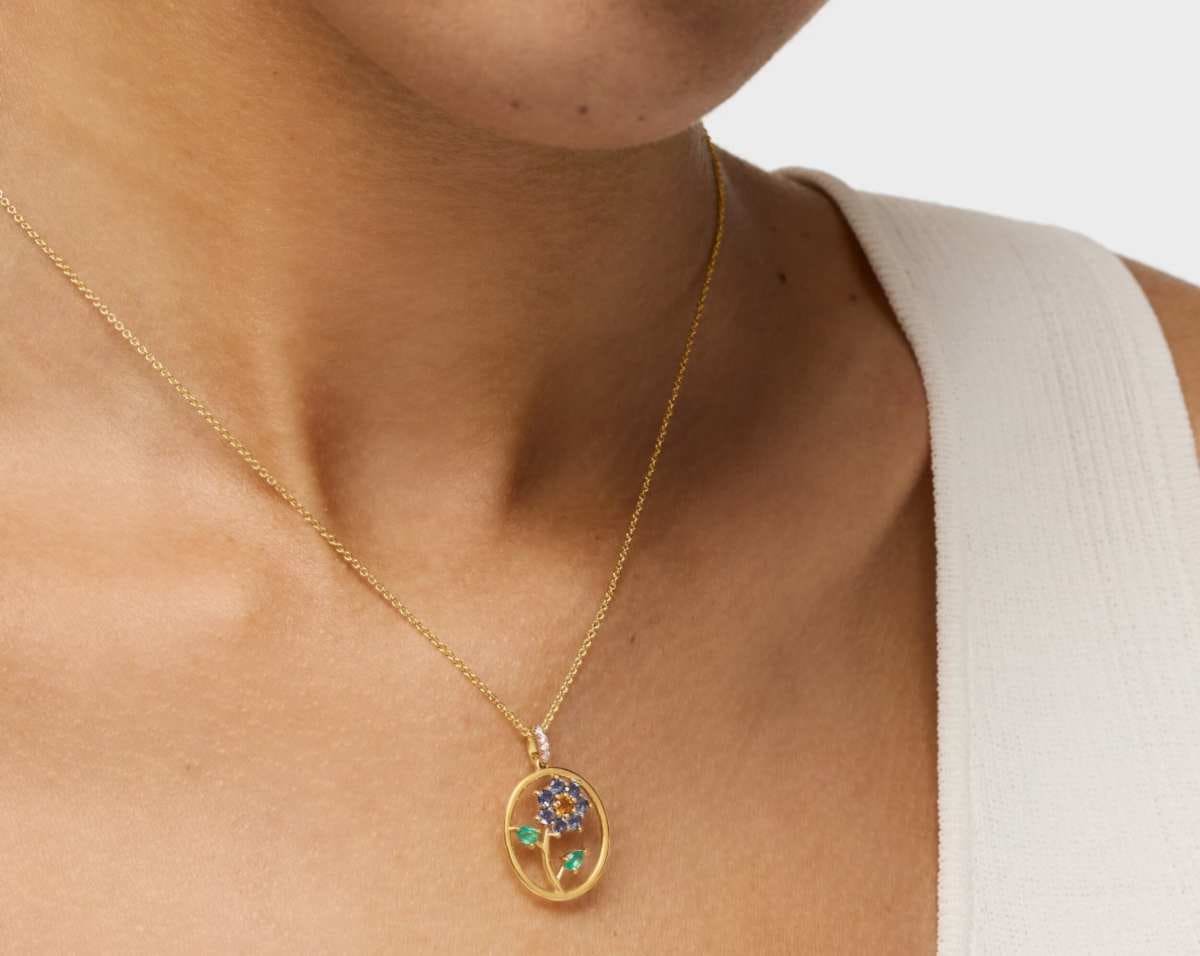 Colgante medalla de oro, gemas y diamantes Daisy de TOUS