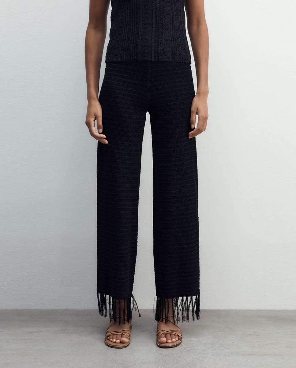 Pantalón con flecos bajos