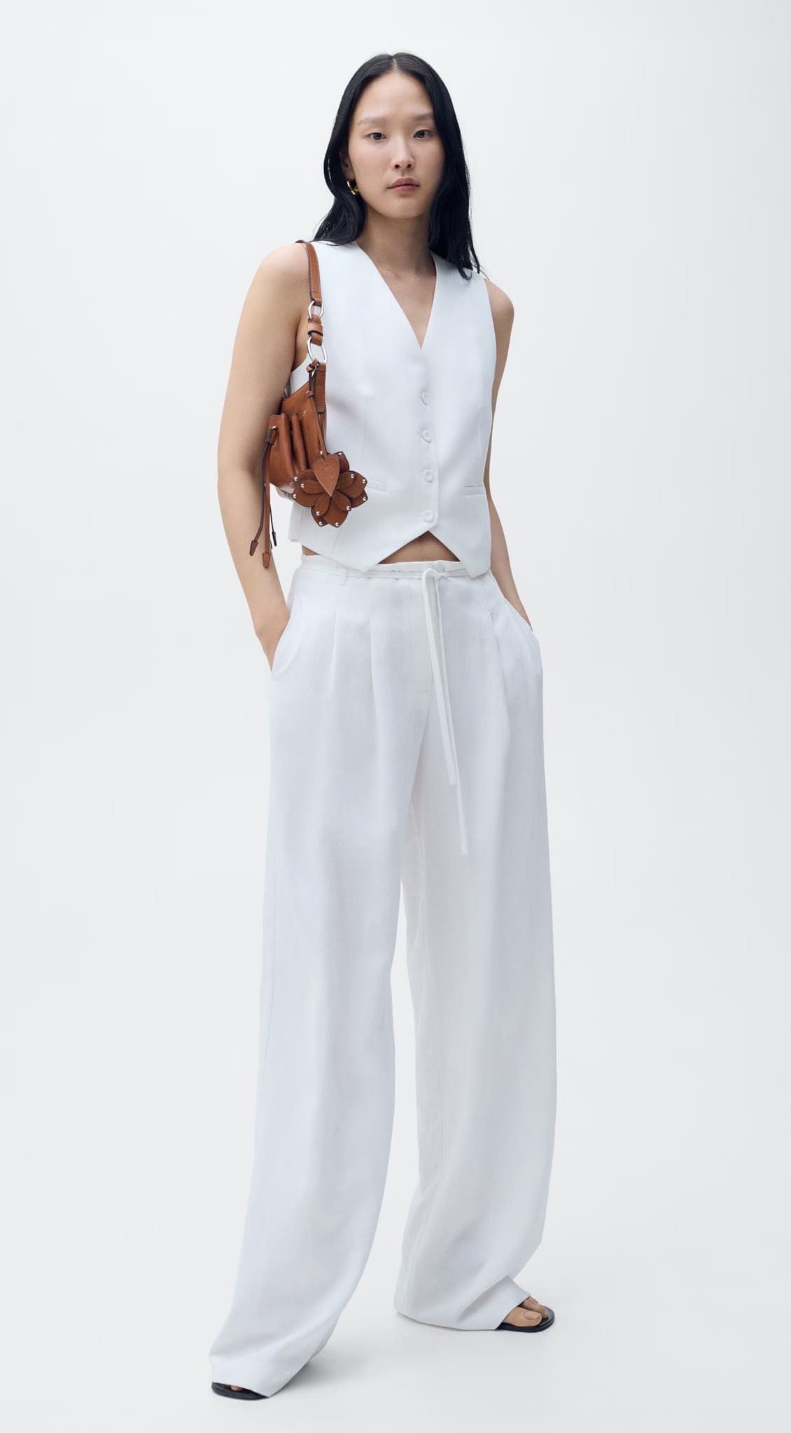 Pantalón traje lyocell cinturón lazo de Mango