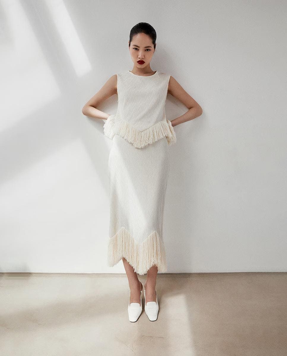 Falda con detalle inferior de flecos