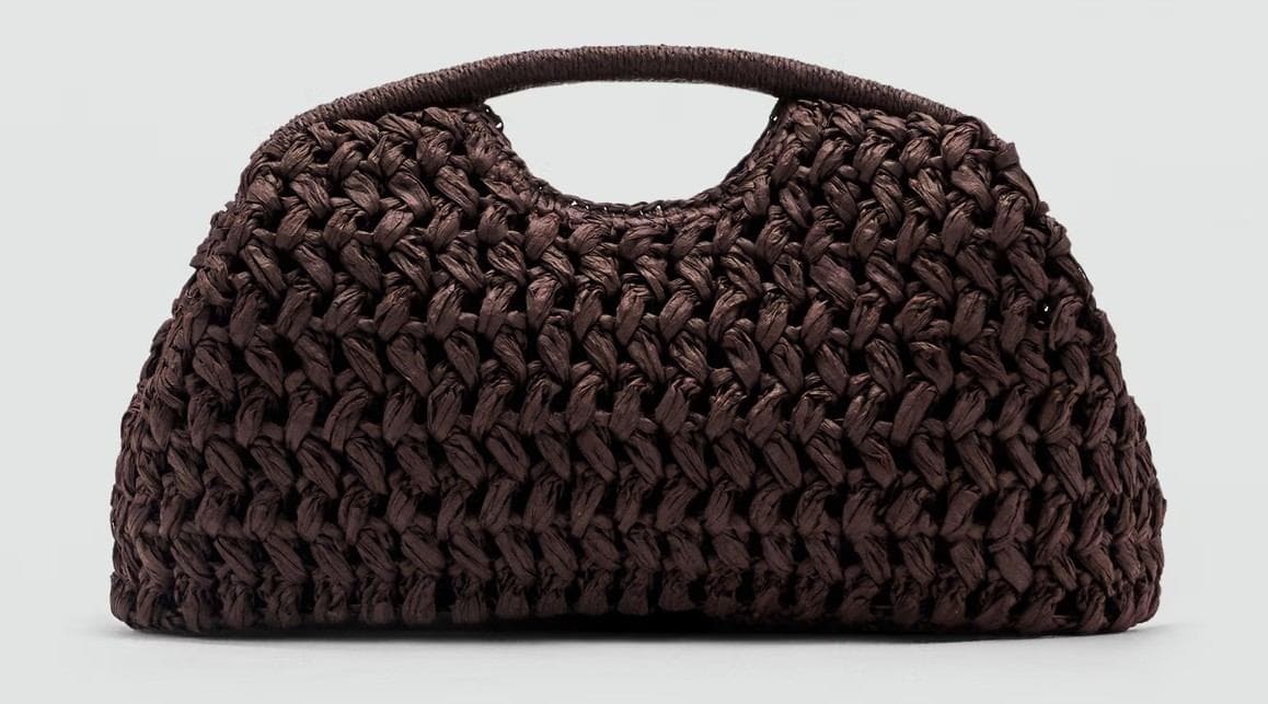 Bolso clutch fibra natural de Mango
