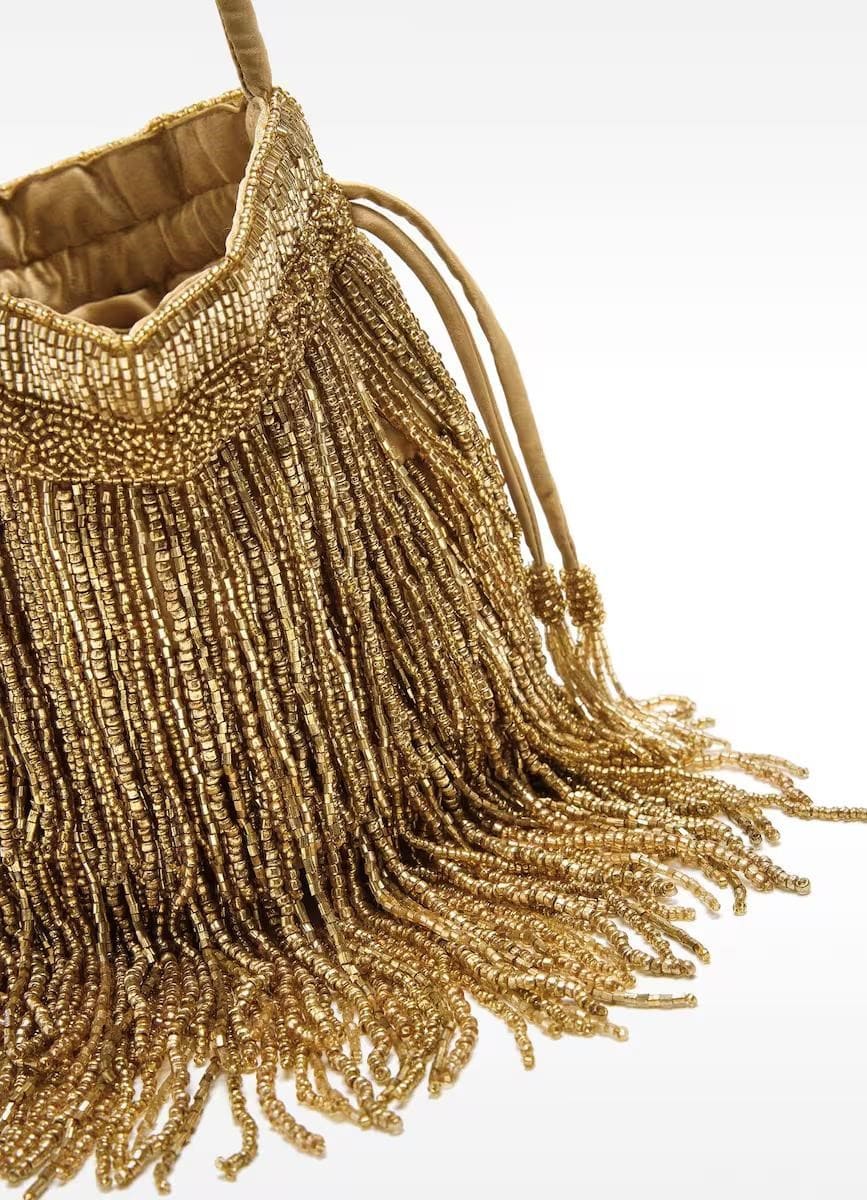 Bolso de fiesta multiposición con abalorios y cuentas en liso