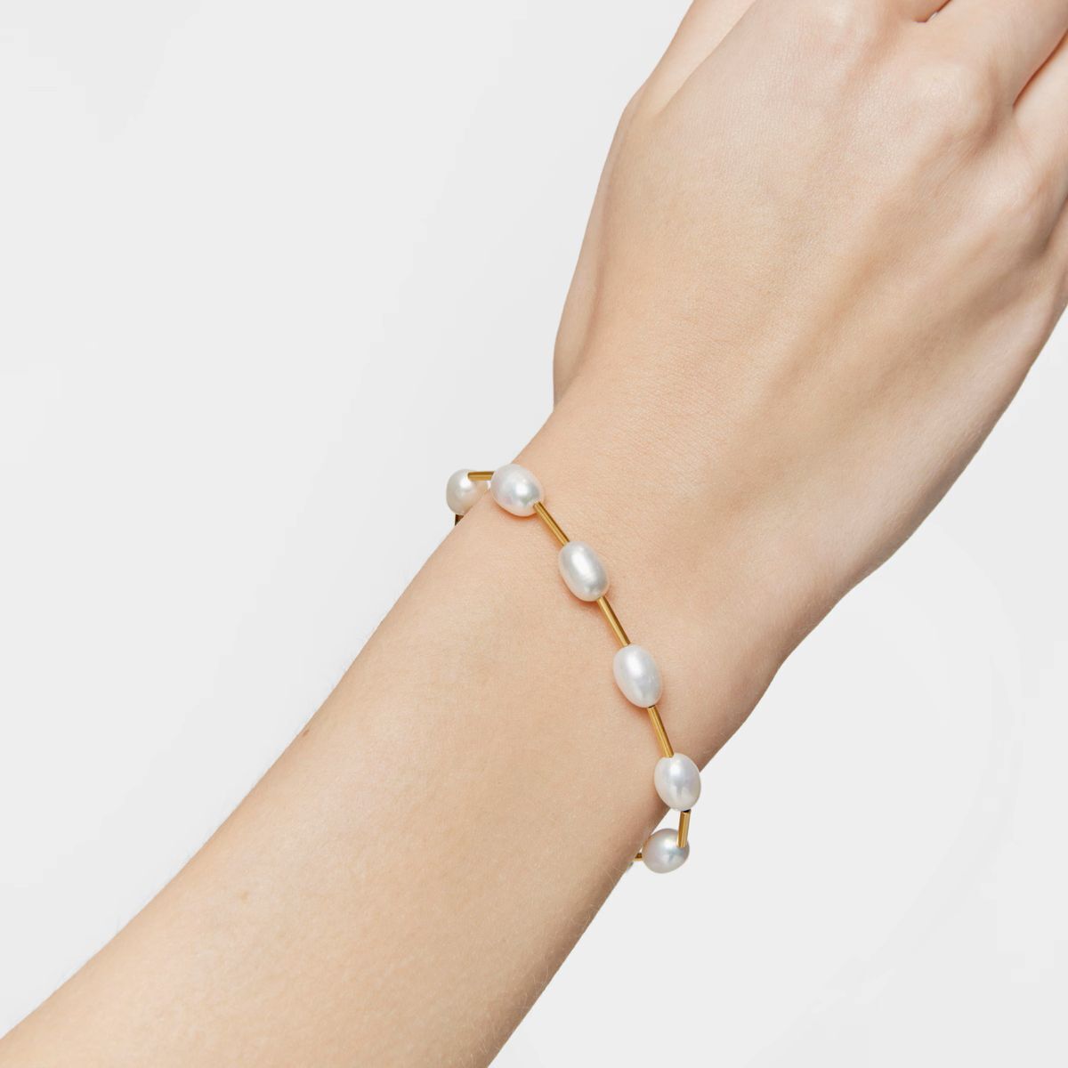 Pulsera tubo con baño de oro de 18 kt sobre plata y perlas cultivadas Gloss de Tous