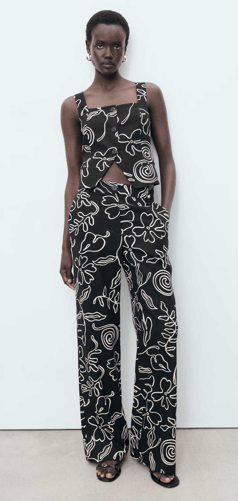 Pantalón mezcla lino estampado floral de Mango